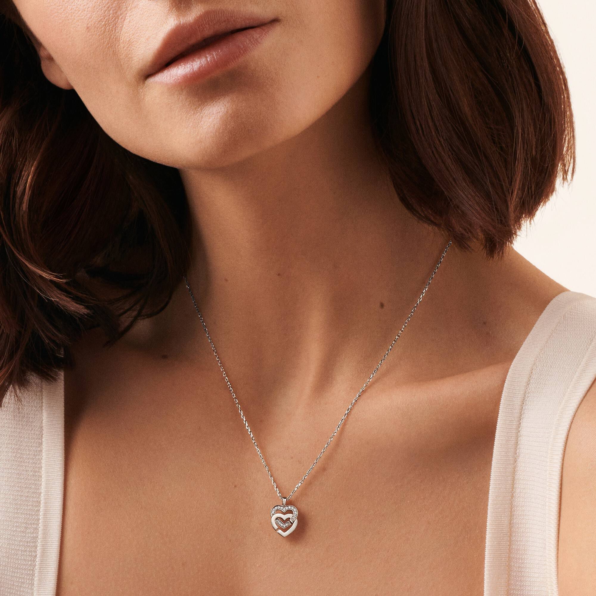 Pendentif Double Coeurs R10 en or blanc avec pav de diamants